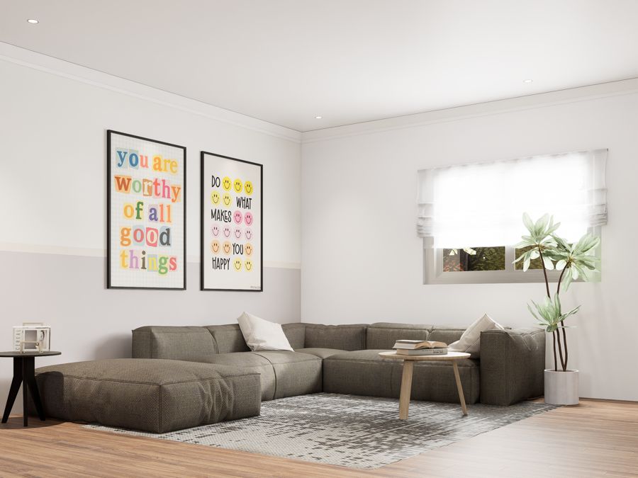 Communal living room with sectional sofa and warm wood floors